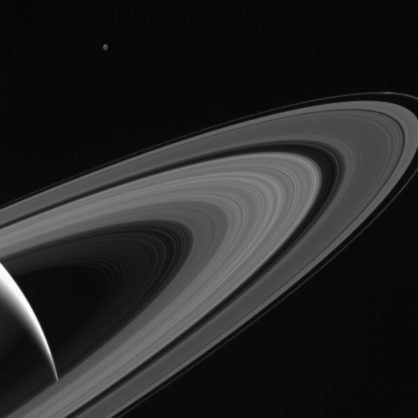 A view of Saturn’s rings and its moon Tethys.
