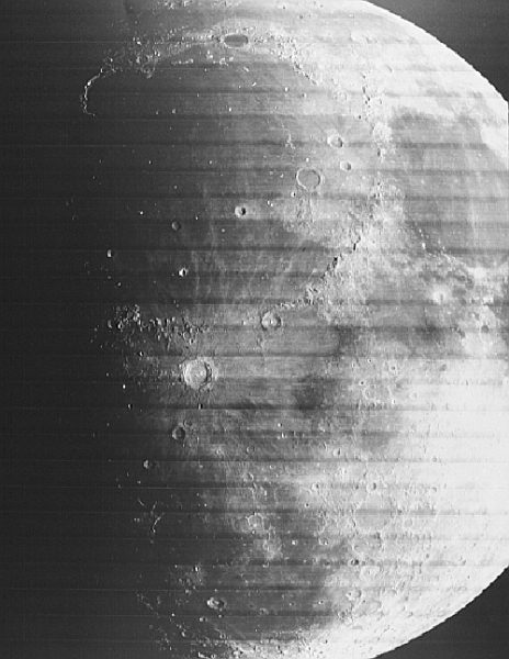 the large circular feature in the top half of this image is the largest basin on the near side of the moon.
