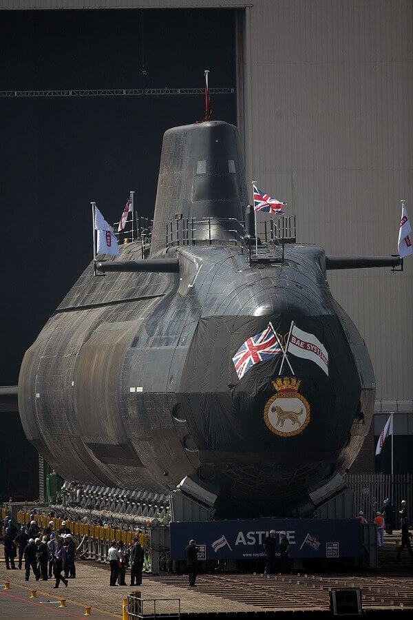 what is it, and why does aukus matter? 3 Nuclear submarine on the ground being launched outside shipyard