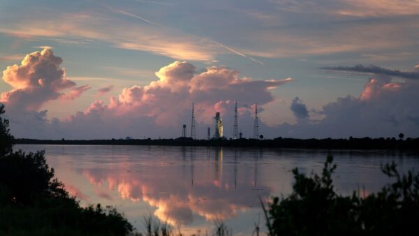 Artemis 1 rocket on launchpad across lake