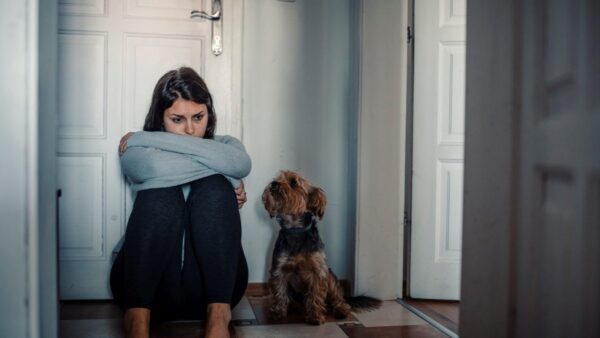 stressed woman and her dog