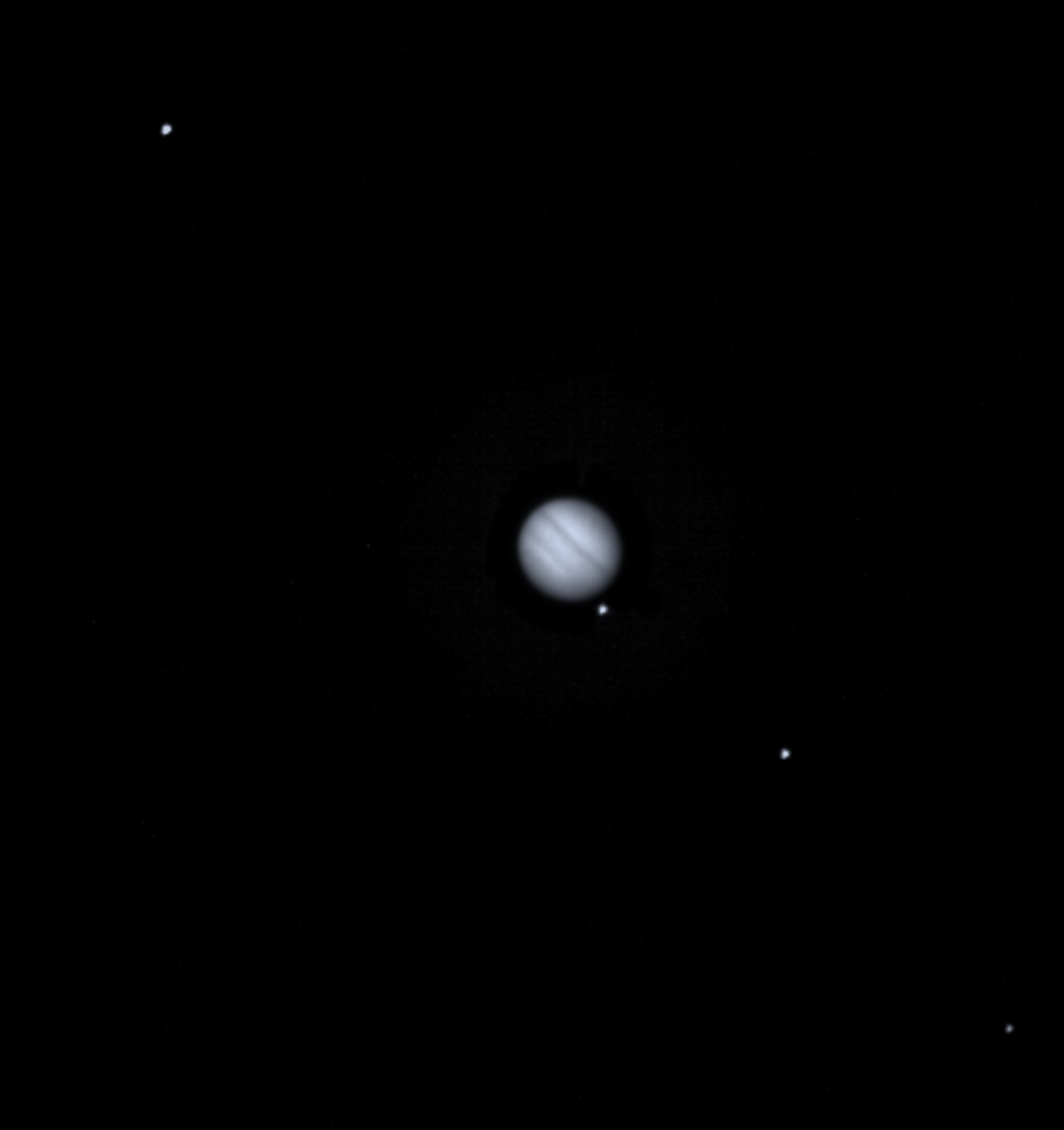 Image of jupiter and four moons