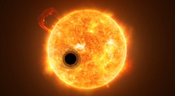 Artistic rendition of the exoplanet WASP-107b and its star, WASP-107. Some of the star's light streams through the exoplanet's extended gas layer.