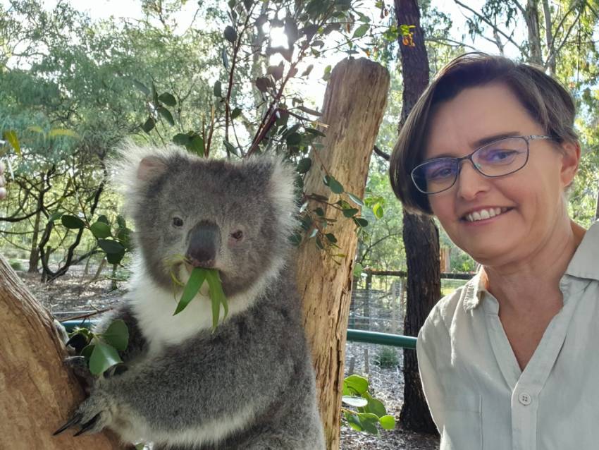Dr Danielle Clode and a koala.