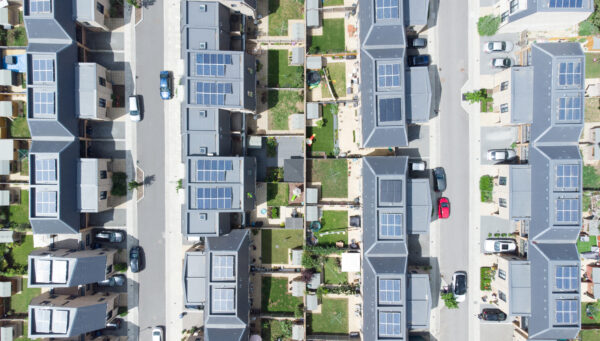 Aerial view of solar panels on rooftops