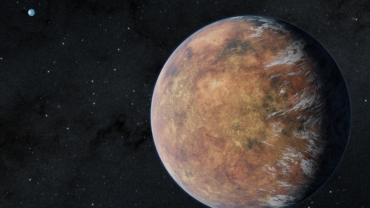 Artists impression of exoplanet TOI 700 e orbits within the habitable zone of its star in this illustration. Its Earth-size sibling, TOI 700 d, can be seen in the distance.