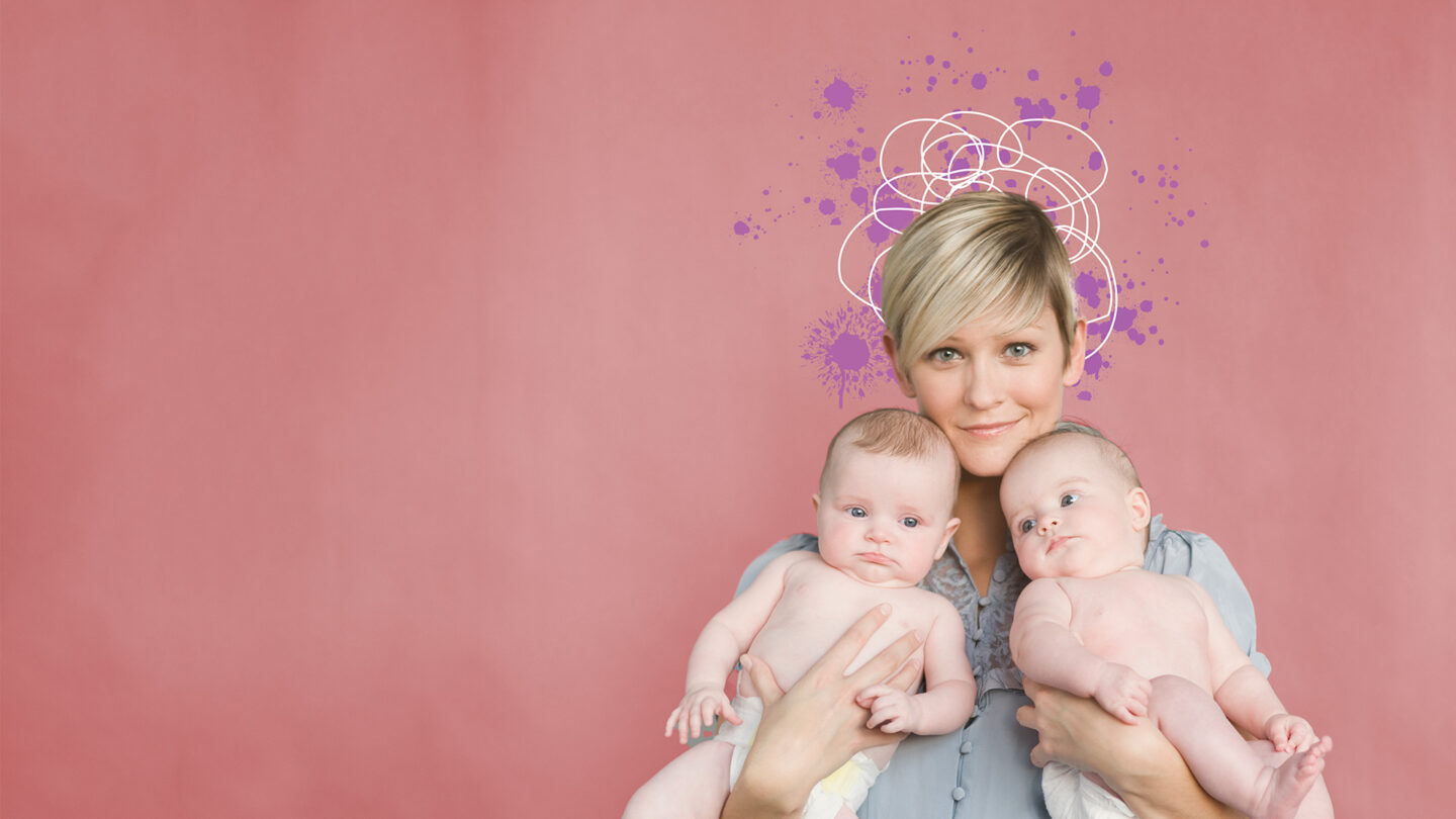 A woman holding two infants with squiggly lines above her head.